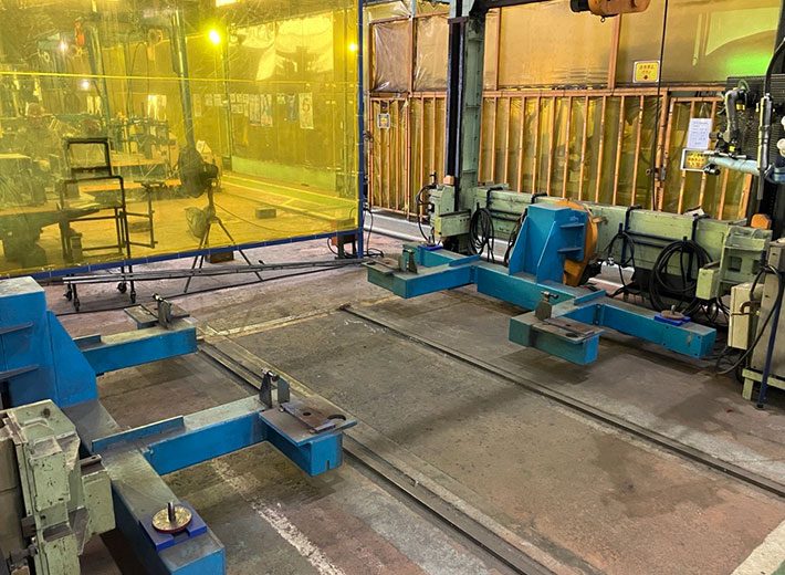 課題の背景とポジショナー工程の重要性